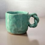 مج فخار يد مضفرة